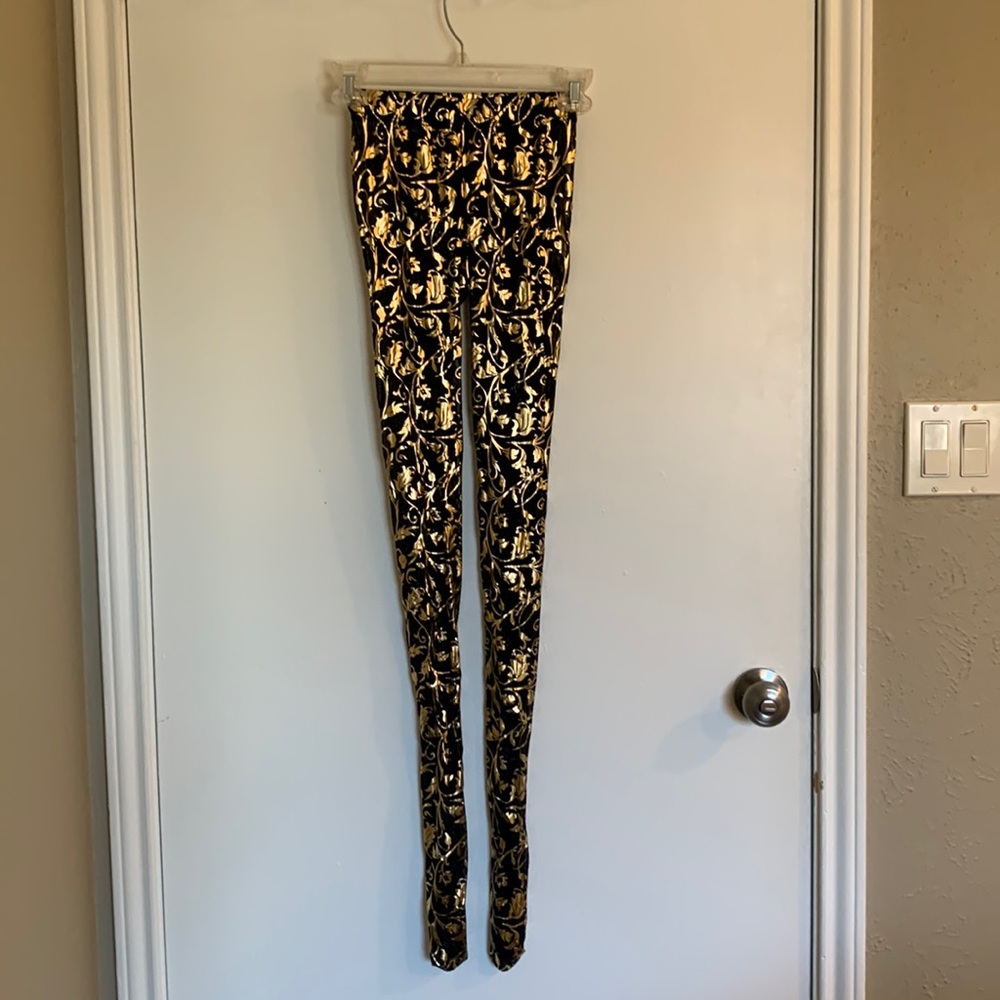 Sheer black and gold tights
